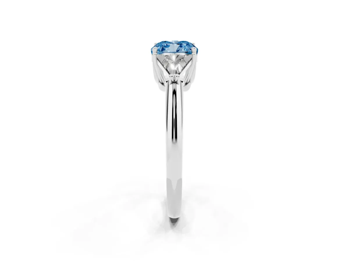 Fancy Blue Three-Stone Cushion Cut Diamond Engagement Ring with Trillion Side Stones and Prong Setting Silver