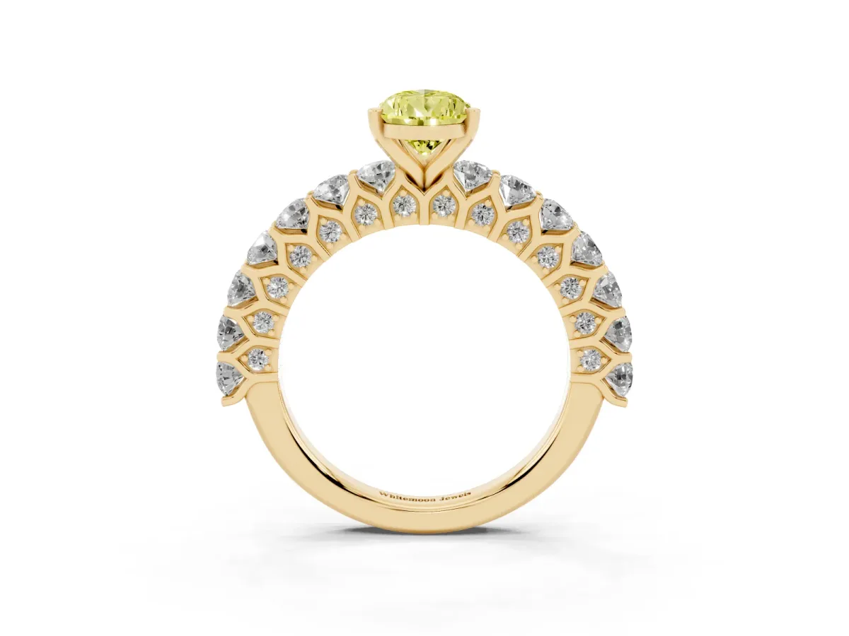 Fancy Yellow Pear Cut Diamond Solitaire Ring with Shared Prong Pavé Band and Four-Prong Setting Yellow gold