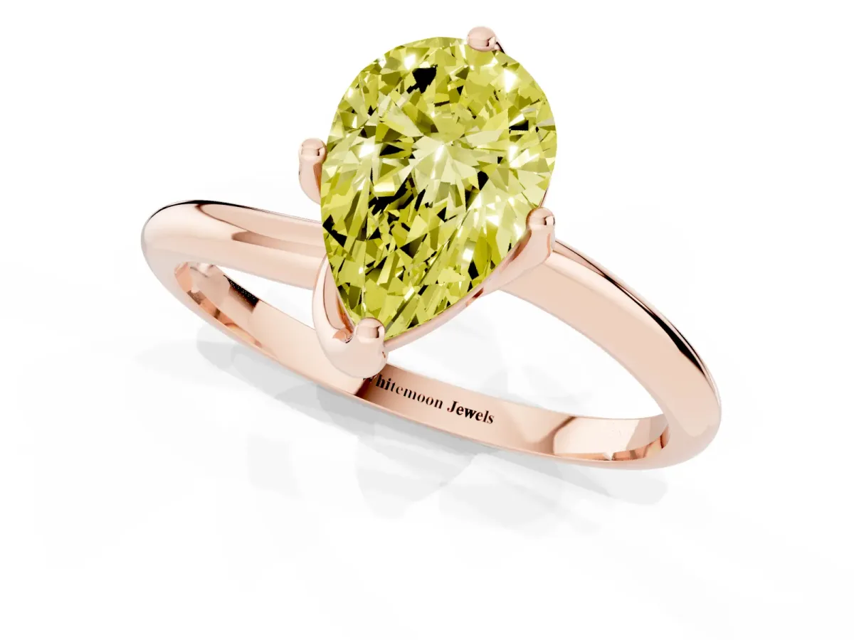 Fancy Yellow Pear Cut Diamond Solitaire Engagement Ring with Four-Prong Setting and Classic Band Rose gold
