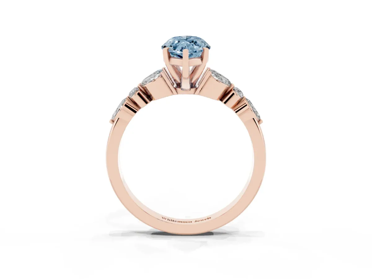 Fancy Blue Marquise Cut Diamond Solitaire Ring with Side Stones and Four-Prong Setting Rose gold