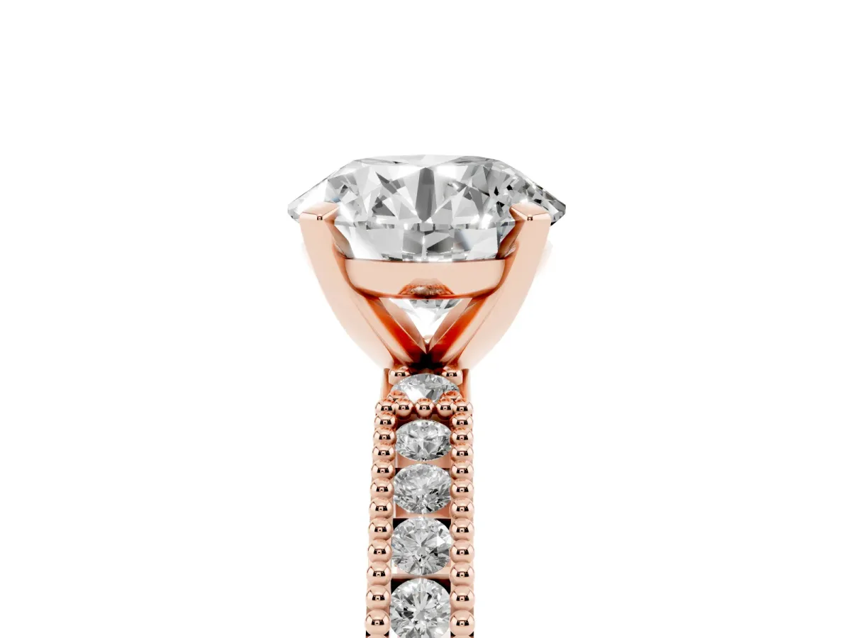 Round Cut Solitaire with Pavé Band and Four-Prong Setting Rose gold