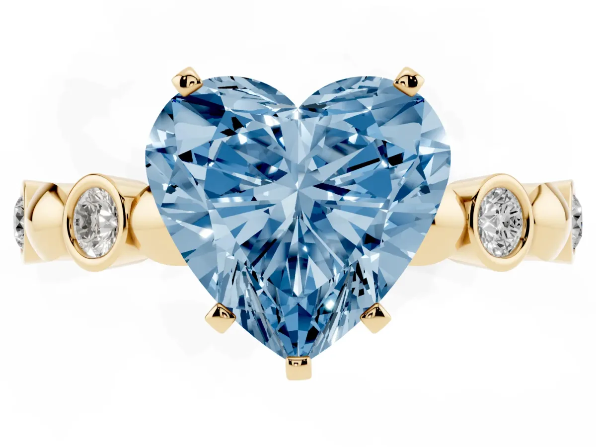 Fancy Blue Heart Cut Solitaire Bezel-Set Diamond Ring with Beaded Band and Four-Prong Setting Yellow gold