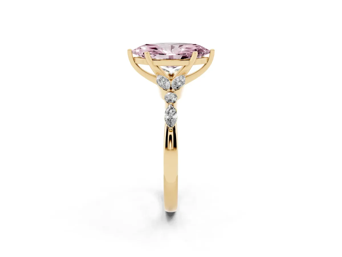 Fancy Pink Marquise Cut Diamond Solitaire Ring with Side Stones and Four-Prong Setting Yellow gold