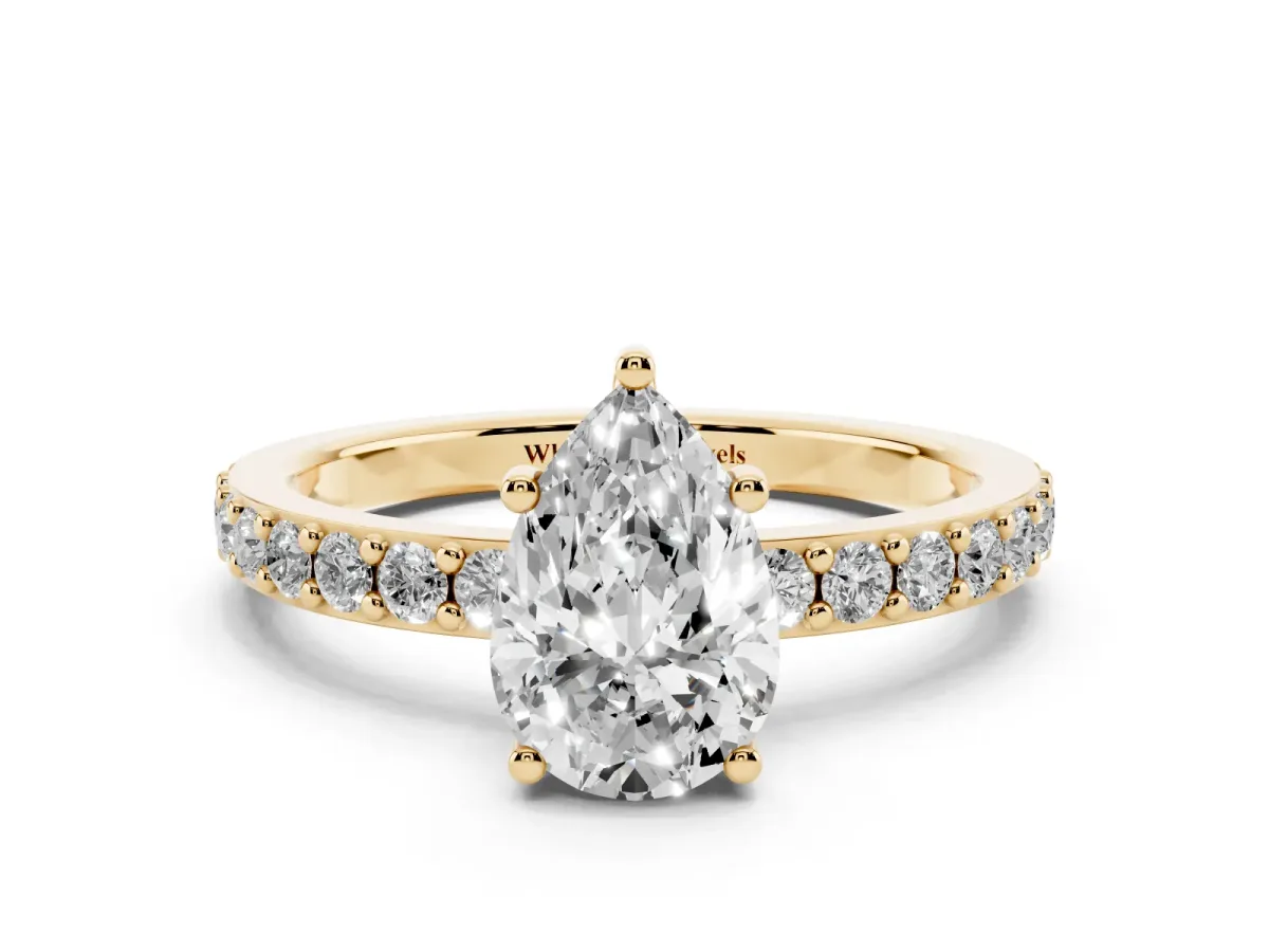 Pear Cut Cut Diamond Solitaire with Pave Band and Four-Prong Setting Yellow gold