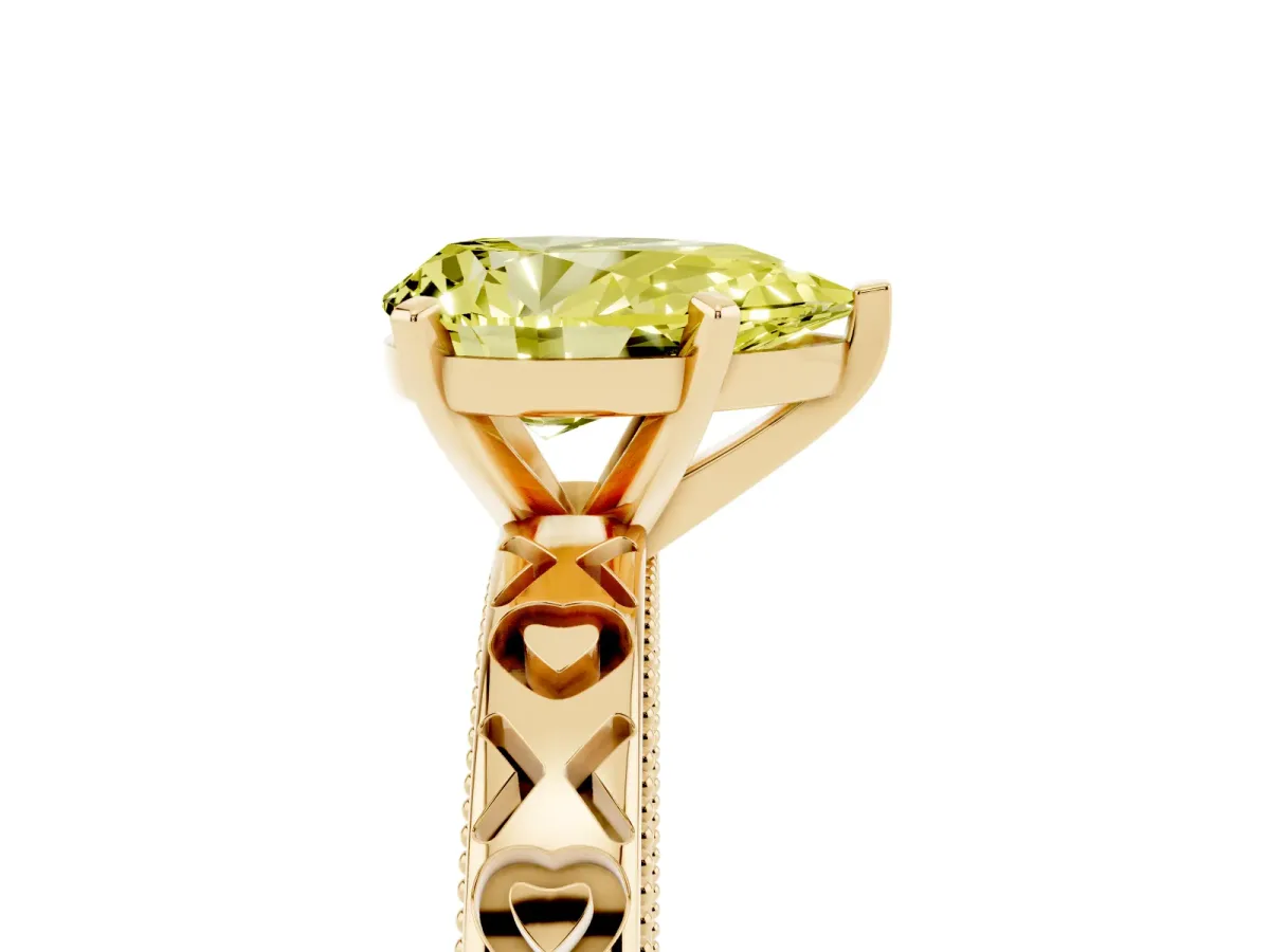 Fancy Yellow Pear Cut Solitaire Diamond Engagement Ring with XO Engraved Band and Four-Prong Setting Yellow gold