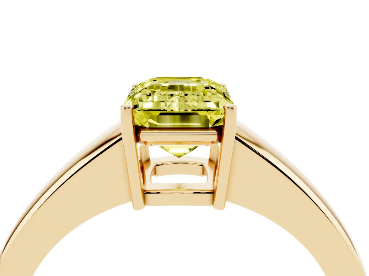 Fancy Yellow Emerald Cut Solitaire Diamond Ring with Tapered Band and Four-Prong Setting Yellow gold