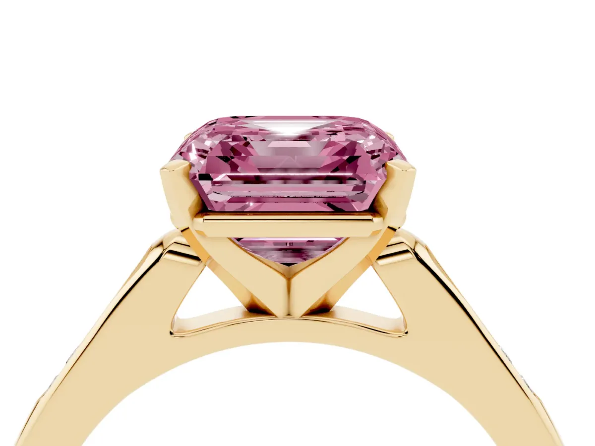 Fancy Pink Asscher Cut Diamond Solitaire Ring with Channel Set Round Band and Prong Setting Yellow gold