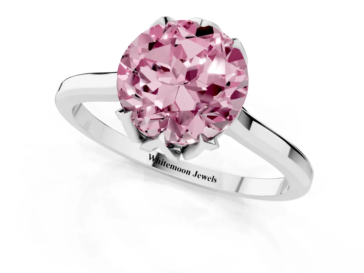 Fancy Pink Round Cut Diamond Solitaire Ring with Flower Prong Setting and Classic Band Silver