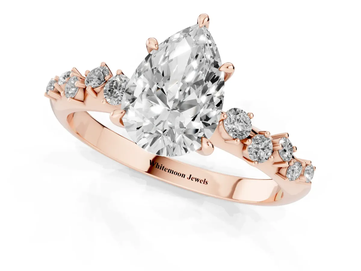Pear Cut Diamond Cluster Side Stone Solitaire Ring with Prong Setting Rose gold
