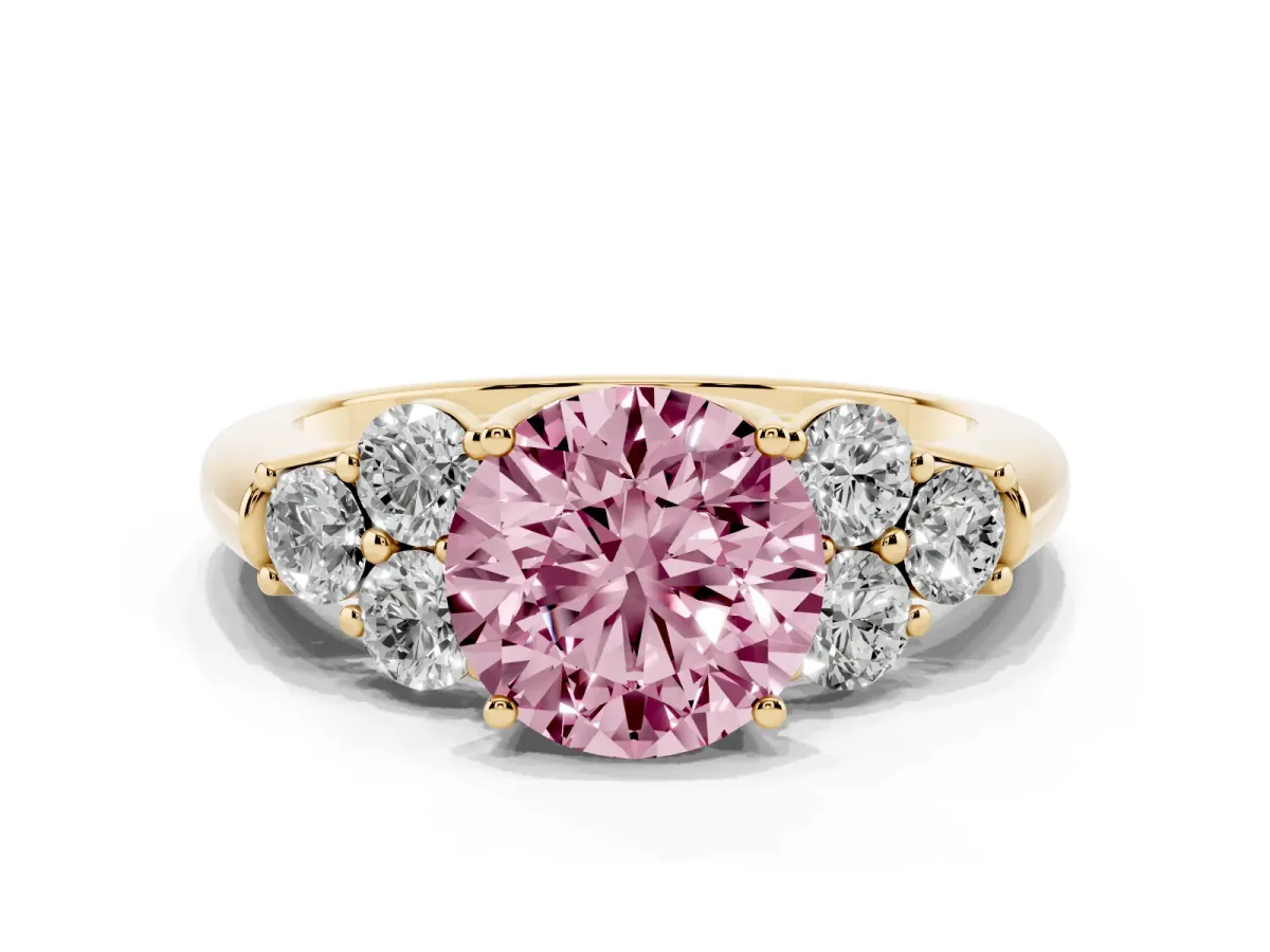 Fancy Pink Round Cut Cut Diamond Cluster Ring with Round Accent Stones and Prong Setting on a Classic Band Yellow gold