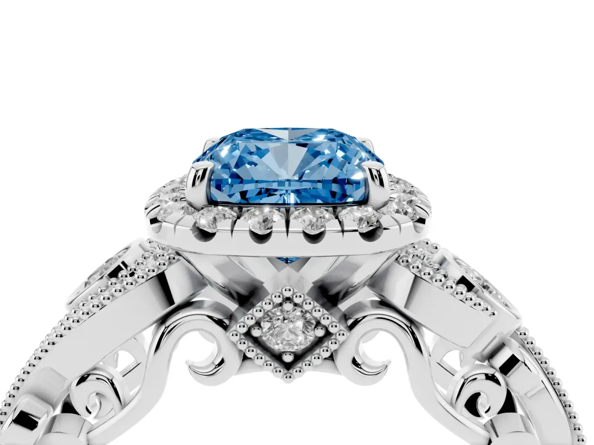 Fancy Blue Cushion Cut Diamond Halo Ring with Milgrain Pavé Band and Four-Prong Setting Platinum