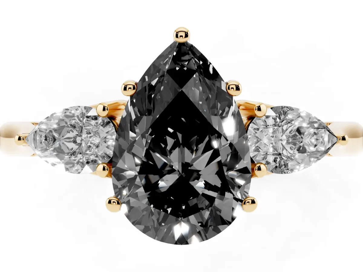 Fancy Black Three-Stone Pear Cut Brilliant Diamond Solitaire Ring with Tapered Band and Four-Prong Setting Yellow gold