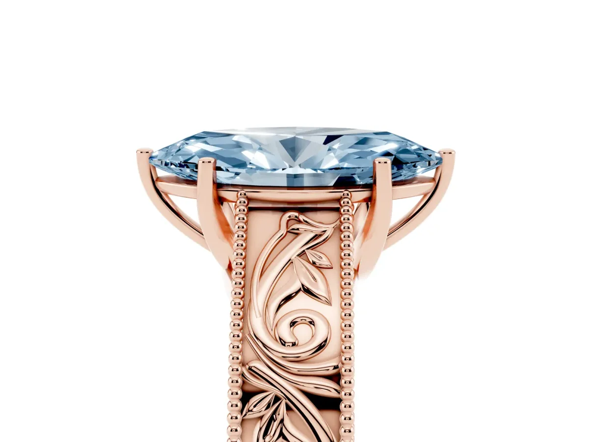 Fancy Blue Marquise Cut Diamond Solitaire Ring with Engraved Band and Four-Prong Setting Rose gold
