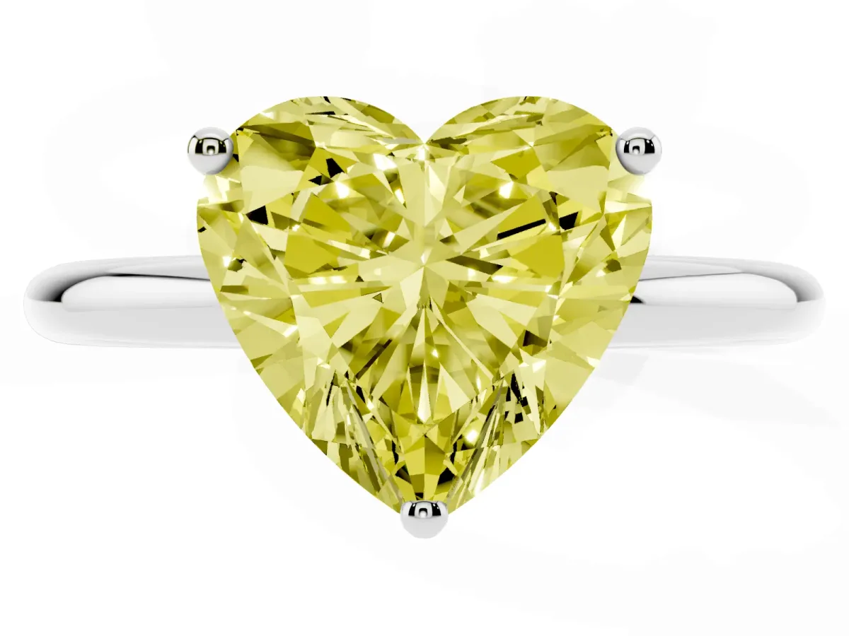 Fancy Yellow Heart Cut Cut Solitaire Engagement Ring with Four-Prong Setting and Classic Band Silver
