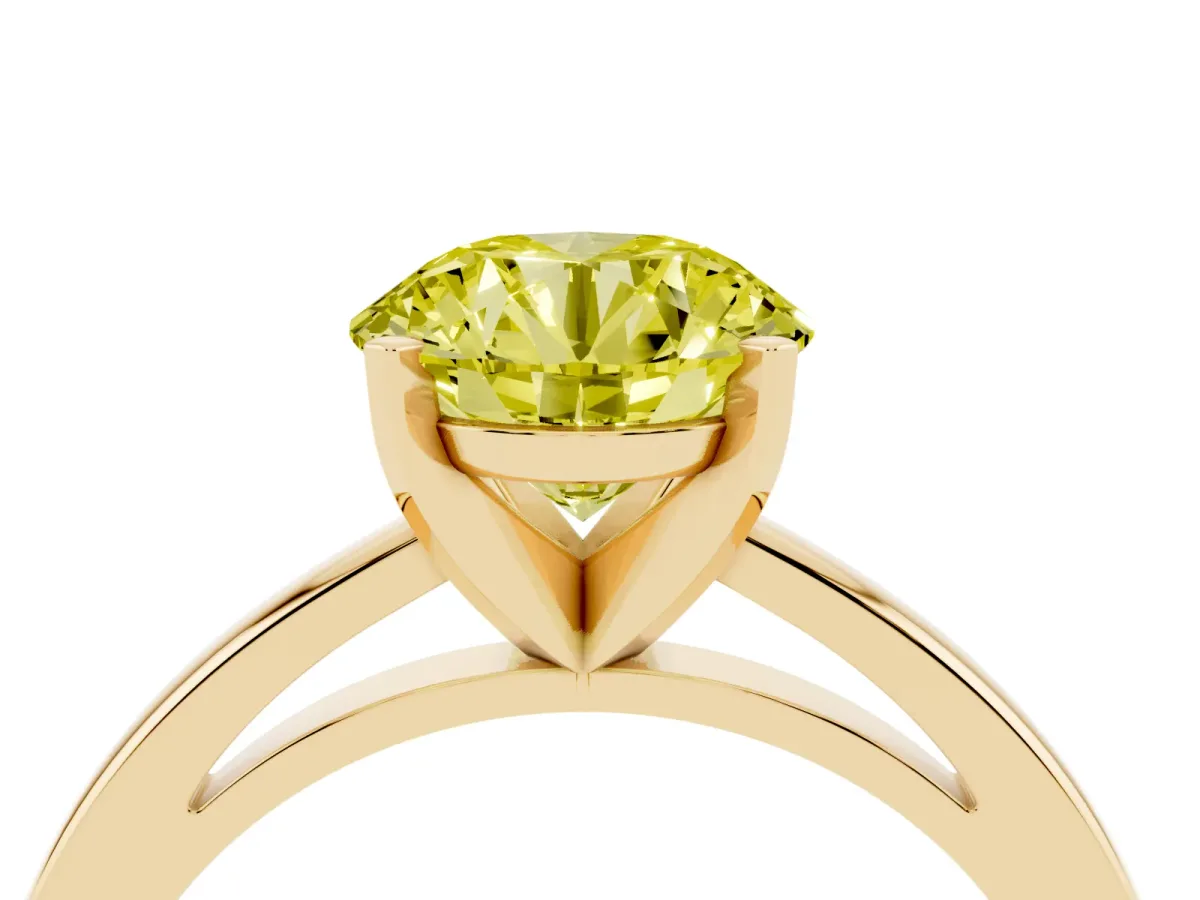 Fancy Yellow Round Cut Solitaire Diamond Engagement Ring with Four-Prong Setting on a Classic Band Yellow gold