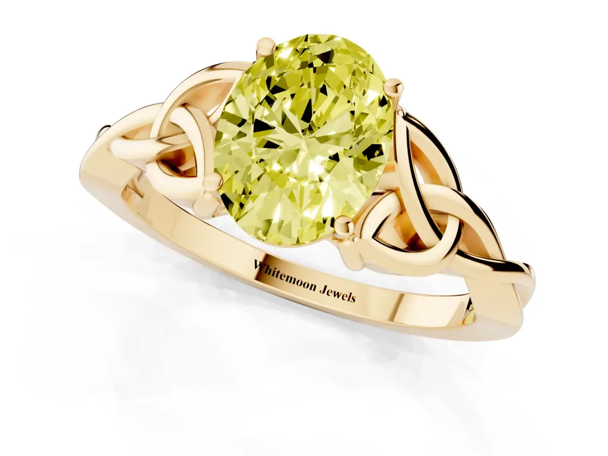 Fancy Yellow Oval Cut Diamond Solitaire Engagement Ring with Celtic Knot Band and Four-Prong Setting Yellow gold