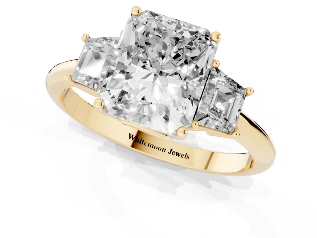 Radiant Cut Diamond Three-Stone Ring with Trapezoid Side Stones and Prong Setting Yellow gold