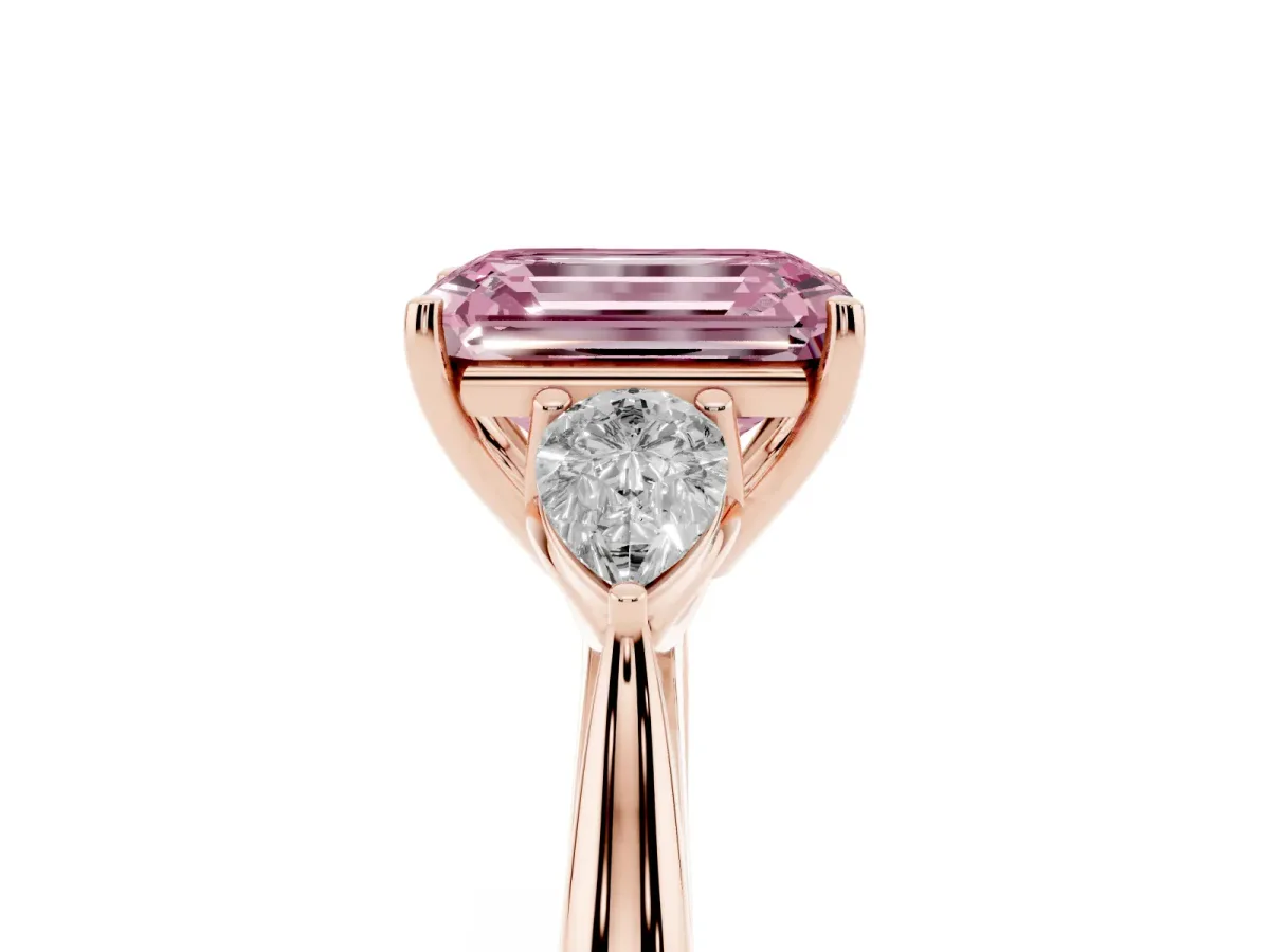 Fancy Pink Emerald Cut Diamond Three-Stone Ring with Pear Side Stones and Prong Setting Rose gold