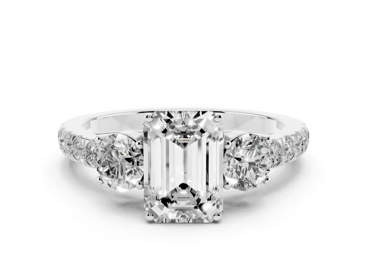 Emerald Cut Cut Diamond Three-Stone Ring with Round Side Stones and Pavé Band Platinum