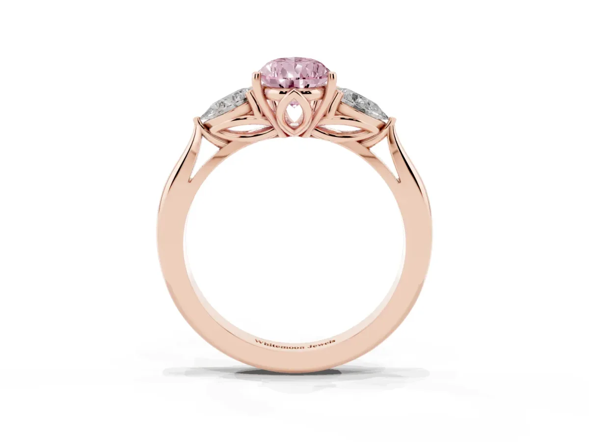 Fancy Pink Three-Stone Pear Cut Diamond Ring with Pear Side Stones in Four-Prong Setting Rose gold