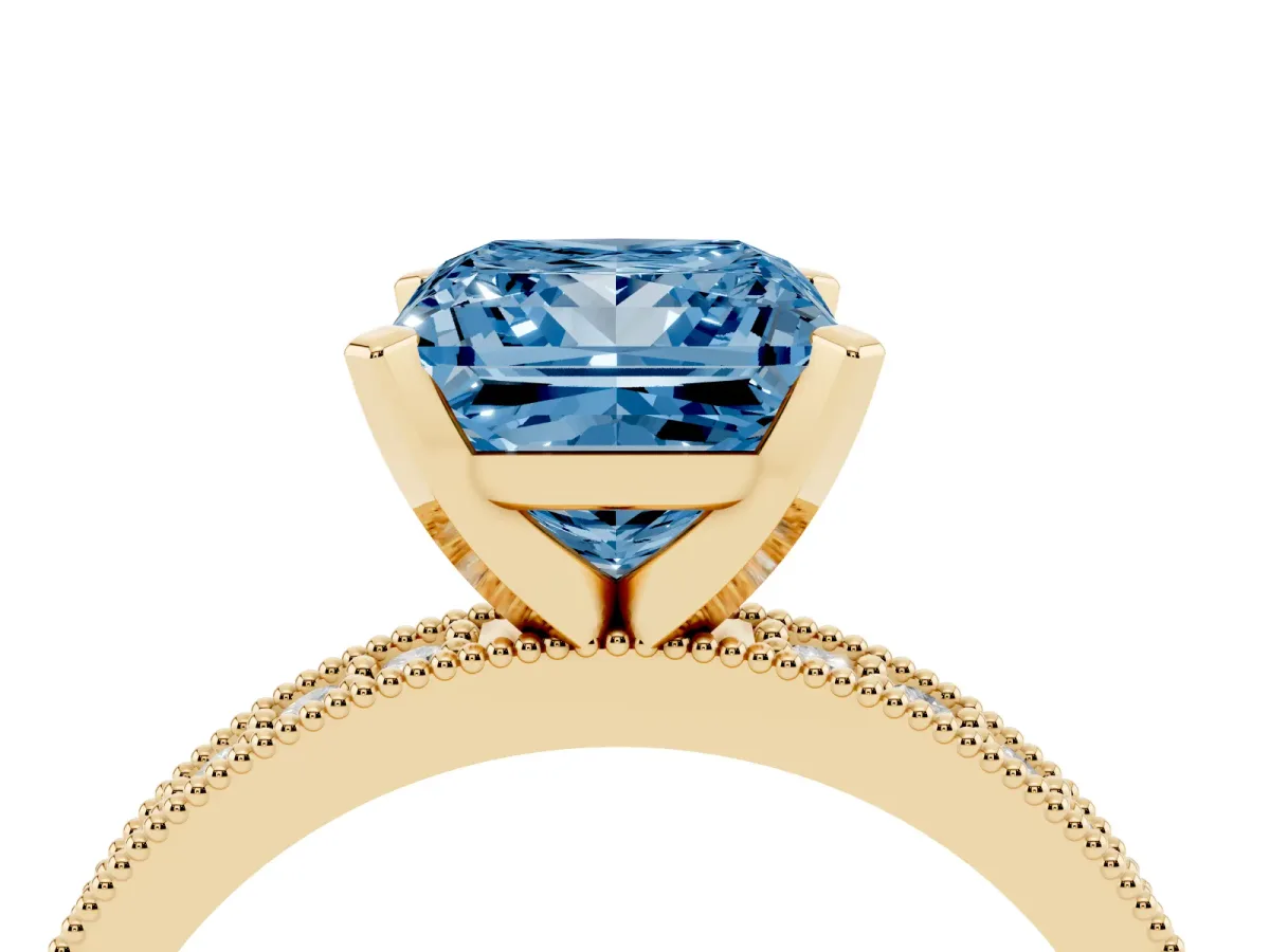 Fancy Blue Princess Cut Diamond Milgrain Pavé Engagement Ring with Four-Prong Setting Yellow gold