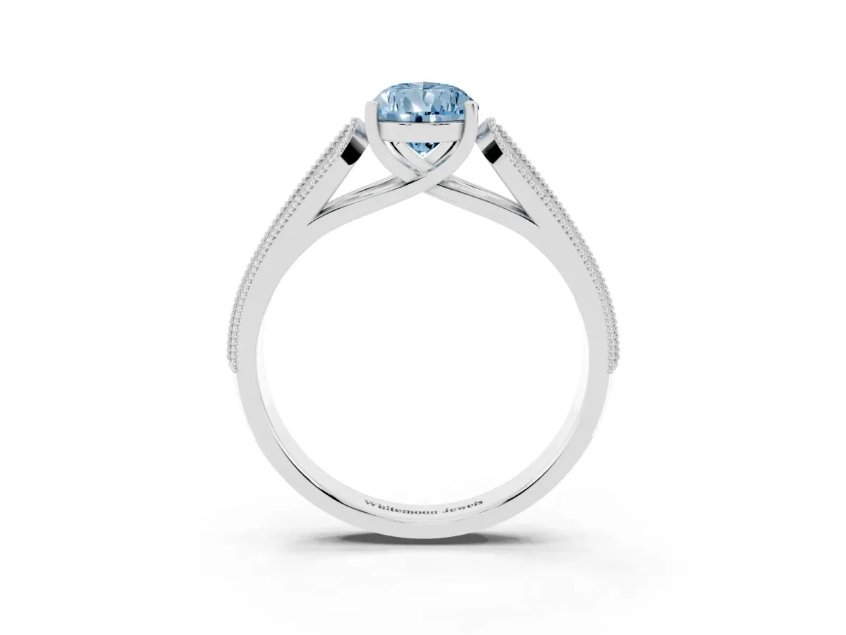 Fancy Blue Pear Cut Cut Pave Split Shank Engagement Ring with Four-Prong Setting White gold