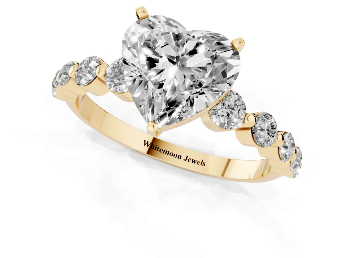 Heart Cut Solitaire Diamond Ring with Pave Band and Four-Prong Setting Yellow gold