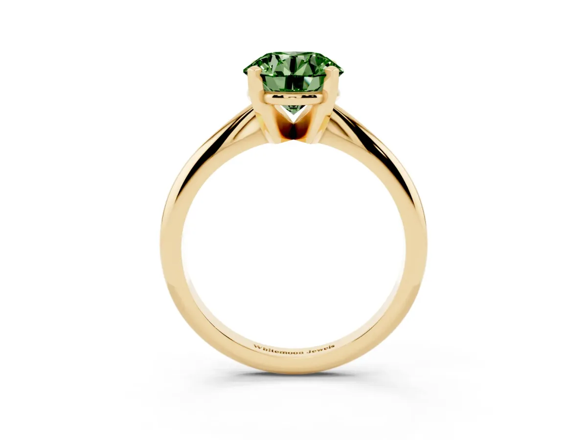 Fancy Green Round Cut Cut Solitaire Ring with Four-Prong Setting on a Classic Band Yellow gold