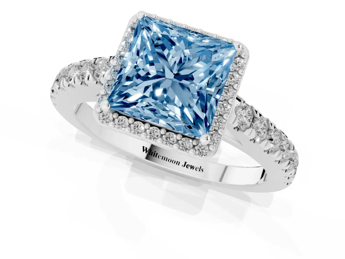 Fancy Blue Princess Cut Cut Halo Diamond Engagement Ring with Pave Band and Four-Prong Setting White gold