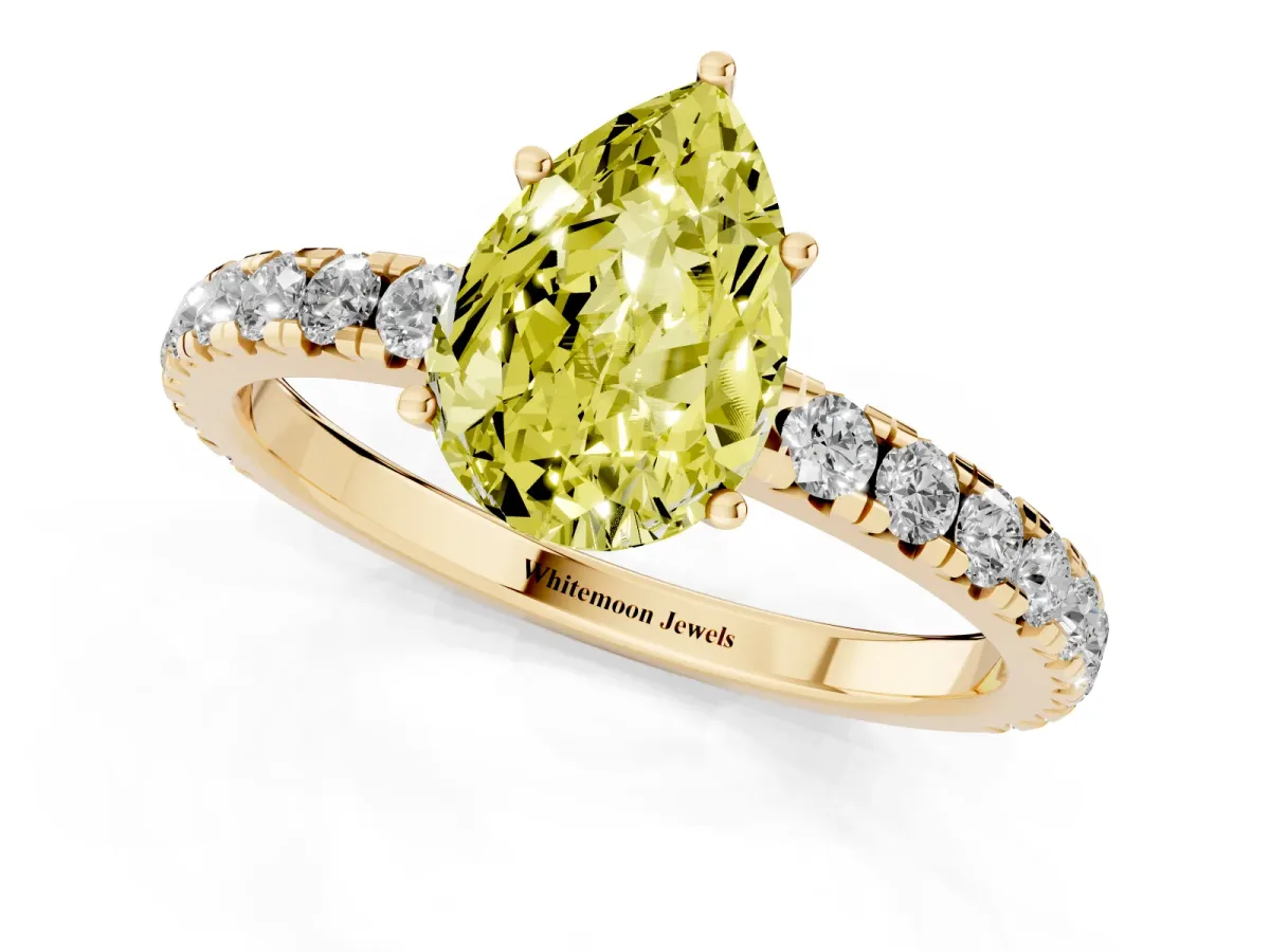Fancy Yellow Pear Cut Diamond Pavé Solitaire Engagement Ring with Four-Prong Setting Yellow gold