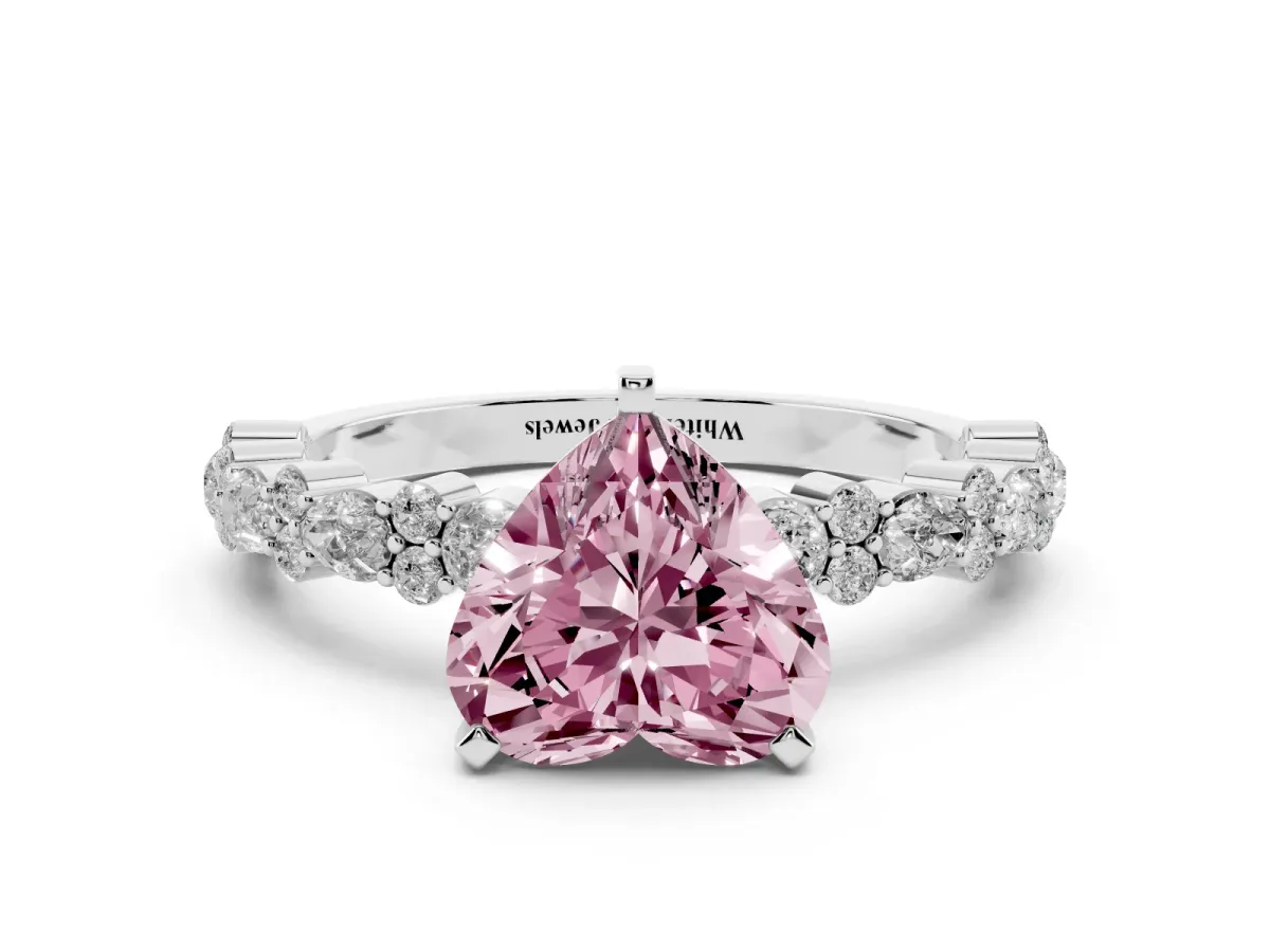 Fancy Pink Heart Cut Diamond Side Stone Solitaire Ring with Round and Four-Prong Setting Platinum