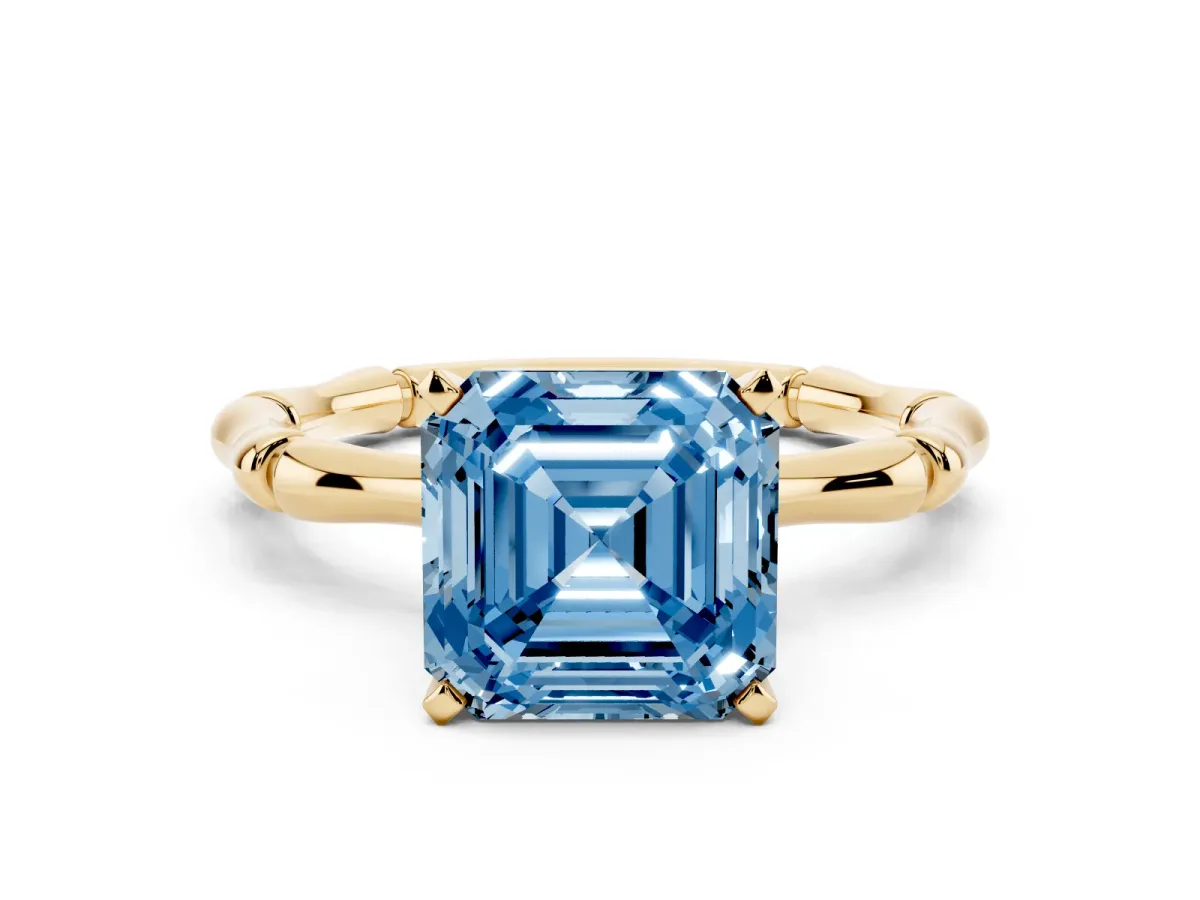 Fancy Blue Asscher Cut Solitaire Diamond Ring with Bamboo Band and Four-Prong Setting Yellow gold