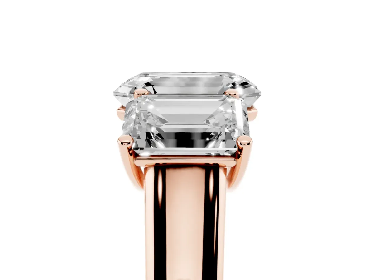 Emerald Cut Three-Stone Diamond Ring with Prong Setting on a Classic Band Rose gold