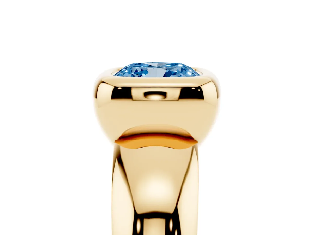 Fancy Blue Bezel Set Cushion Cut Solitaire Ring with Wide Band Yellow gold