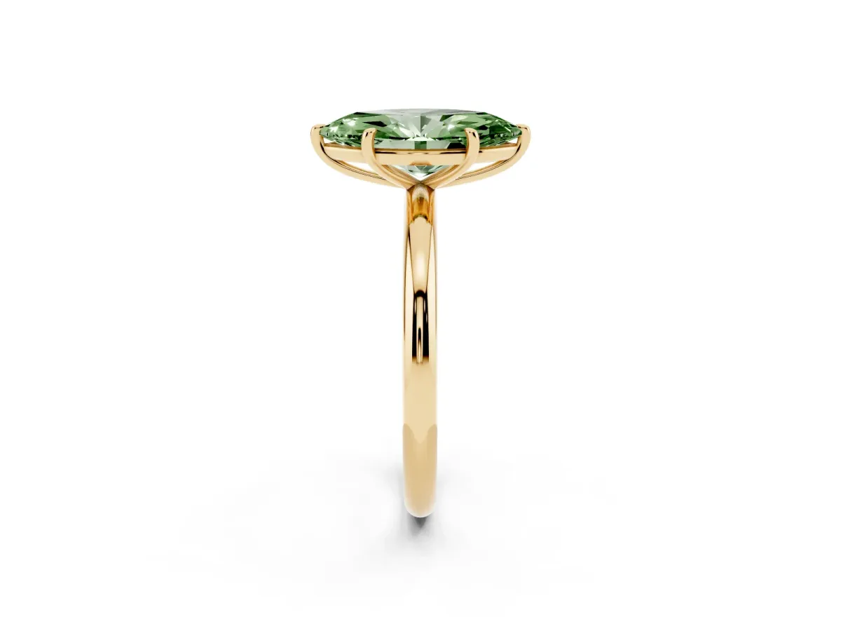 Fancy Green Marquise Cut Solitaire Diamond Ring with Four-Prong Setting on a Plain Band Yellow gold