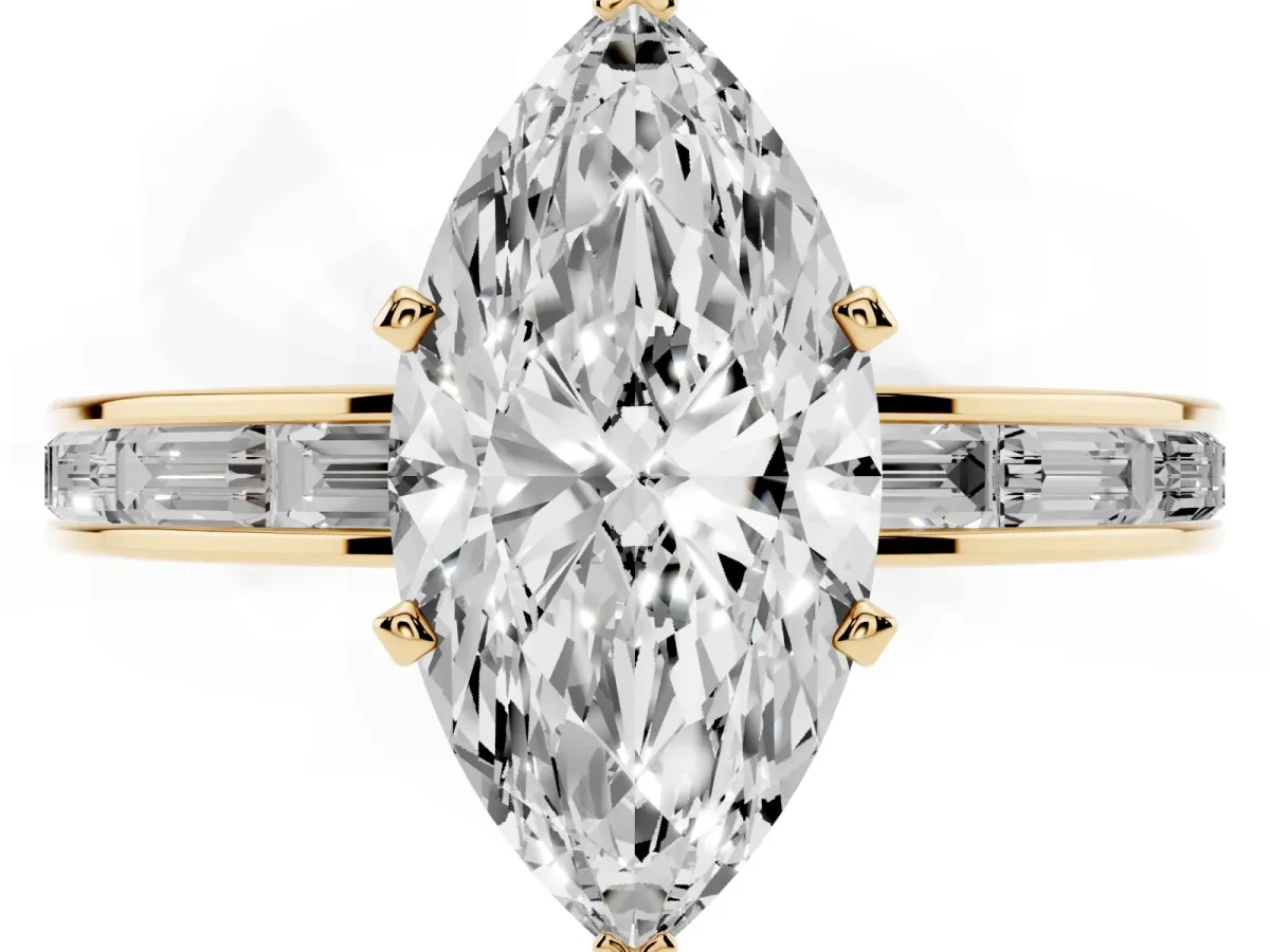 Marquise Cut Solitaire Diamond Ring with Channel-Set Baguette Band and Four-Prong Setting Yellow gold