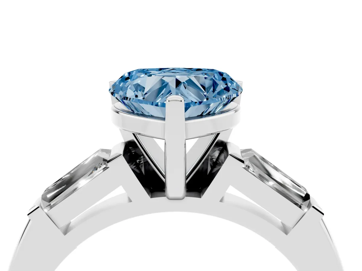 Fancy Blue Heart Cut Solitaire with Tapered Baguette Side Stones on a Classic Band with Four-Prong Setting White gold