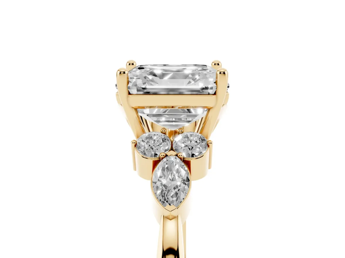 Asscher Cut Brilliant Diamond Solitaire Ring with Pear Side Stones and Four-Prong Setting Yellow gold