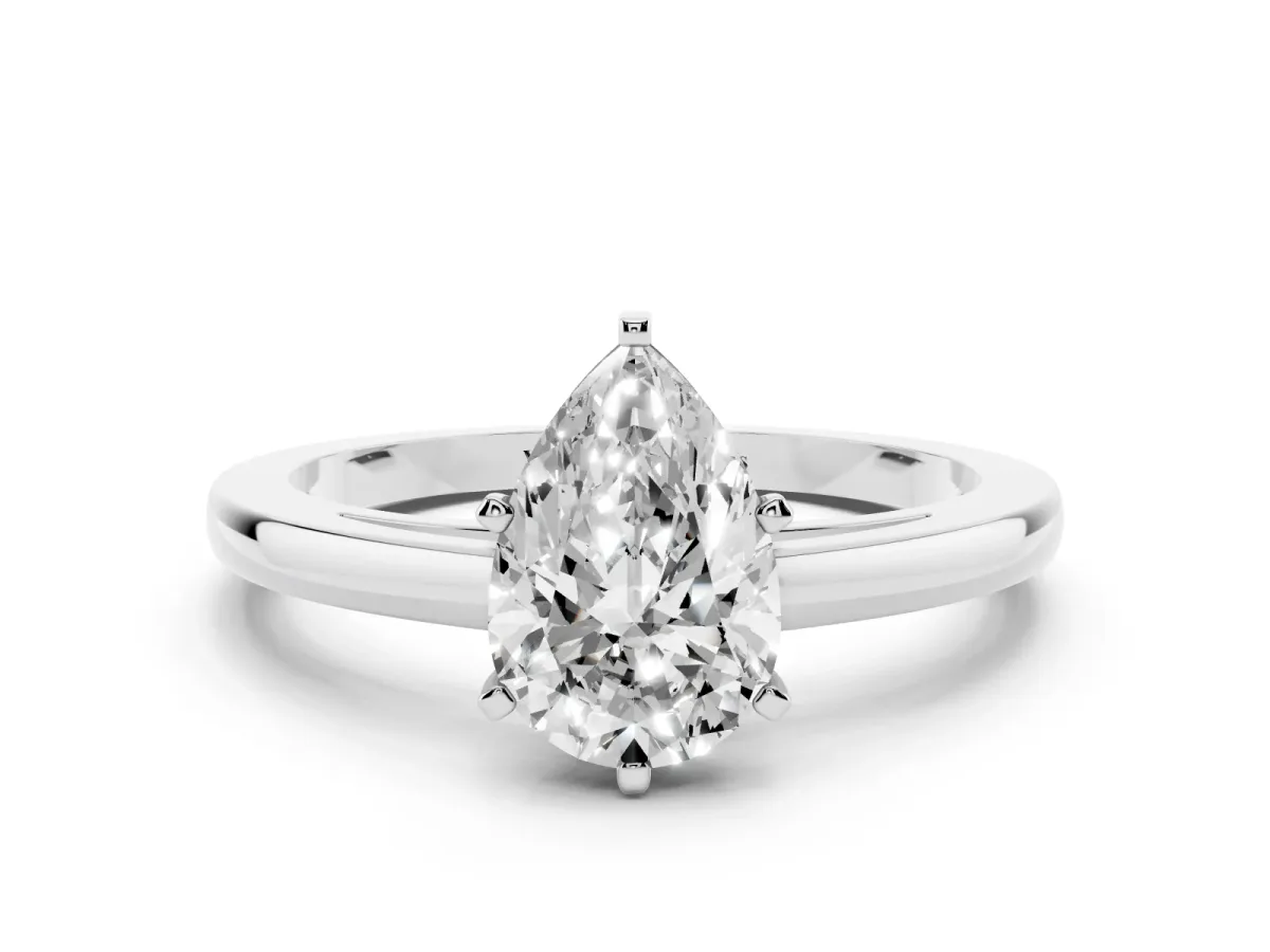 Pear Cut Solitaire Diamond Engagement Ring with Four-Prong Setting on a Classic Band White gold