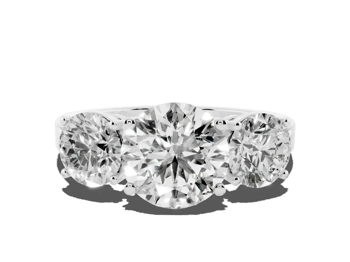 Three-Stone Round Cut Cut Diamond Engagement Ring with Flat Band and Four-Prong Setting Silver