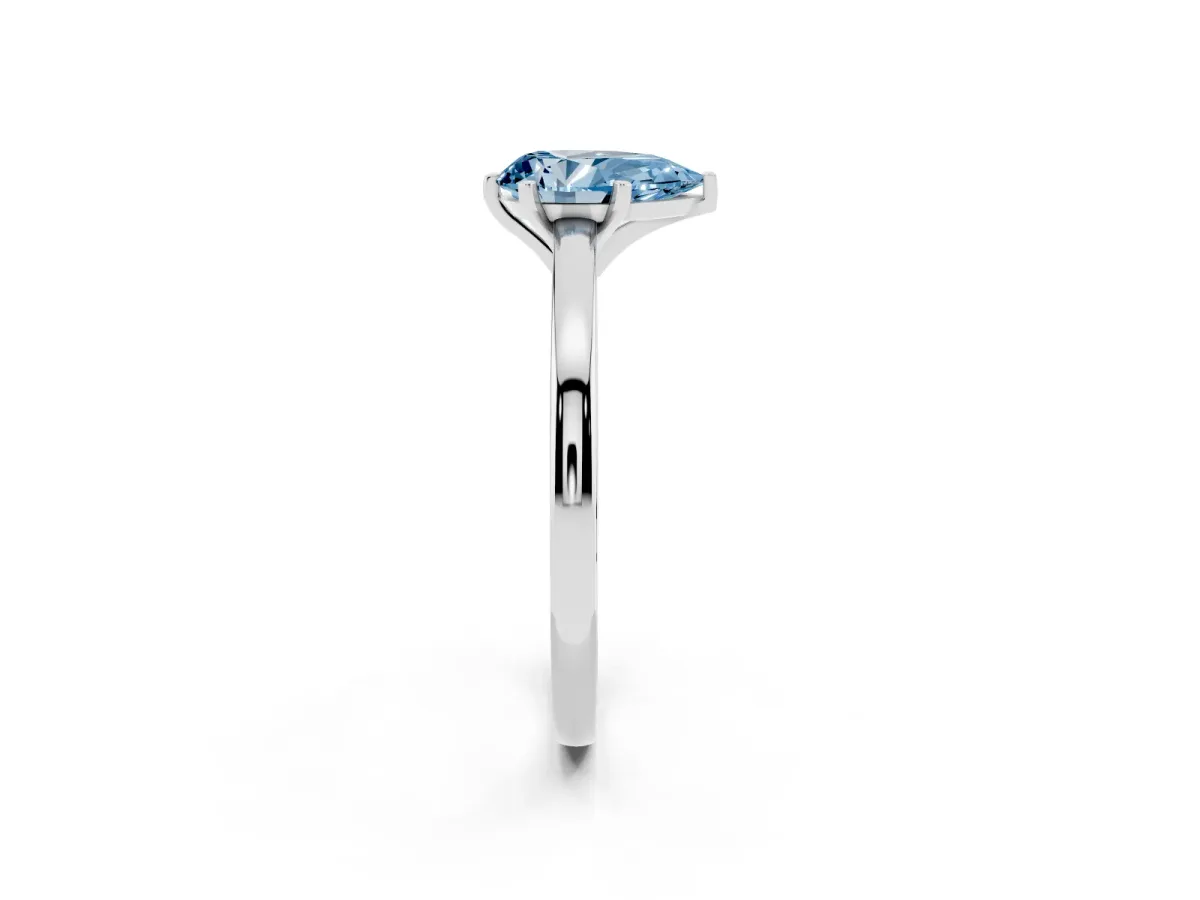 Fancy Blue Pear Cut Solitaire Diamond Engagement Ring with Four-Prong Setting on a Classic Band Silver