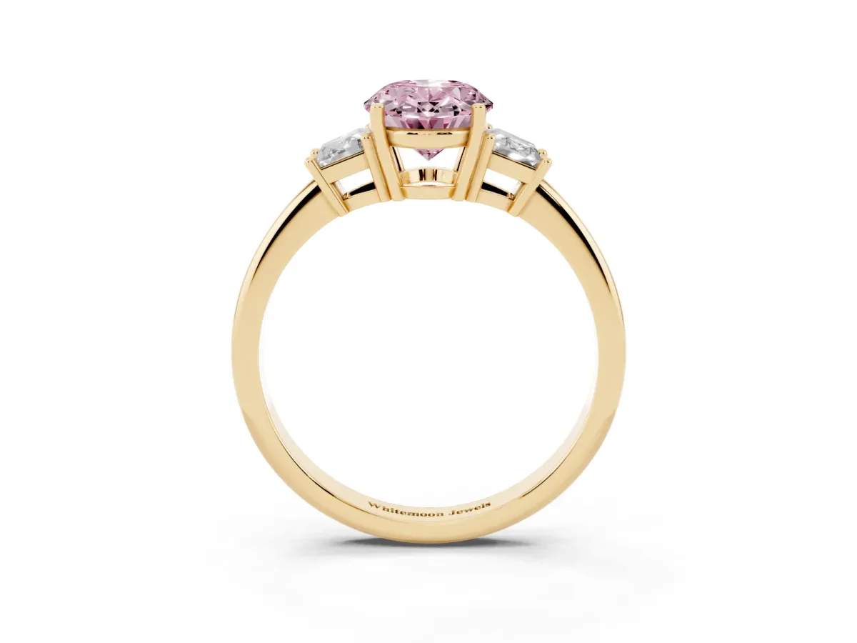 Fancy Pink Oval Cut Diamond Three-Stone Ring with Trapezoid Side Stones and Prong Setting Yellow gold