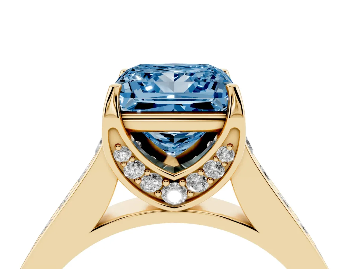 Fancy Blue Princess Cut Brilliant Cut Diamond Engagement Ring with Pavé Band and Four-Prong Setting Yellow gold