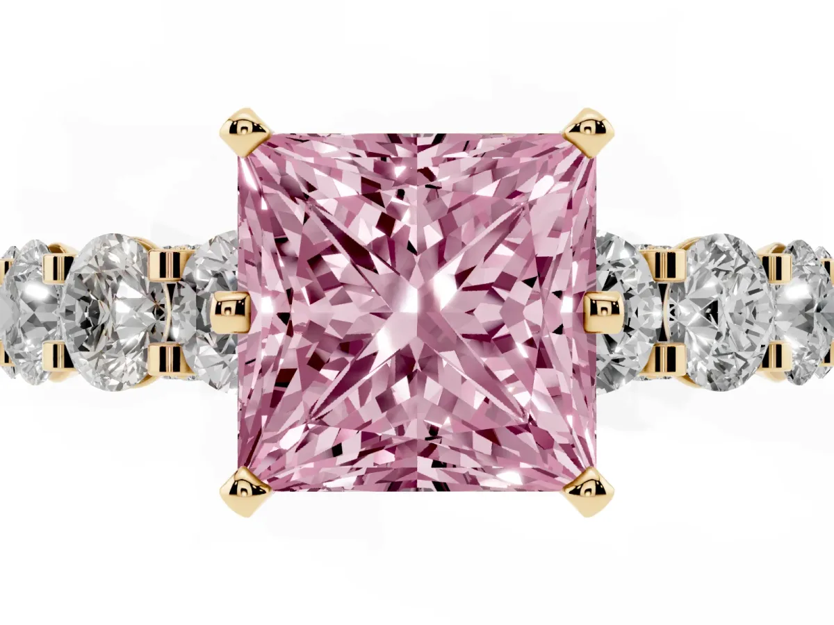 Fancy Pink Princess Cut Diamond Side Stone Engagement Ring with Four-Prong Setting Yellow gold