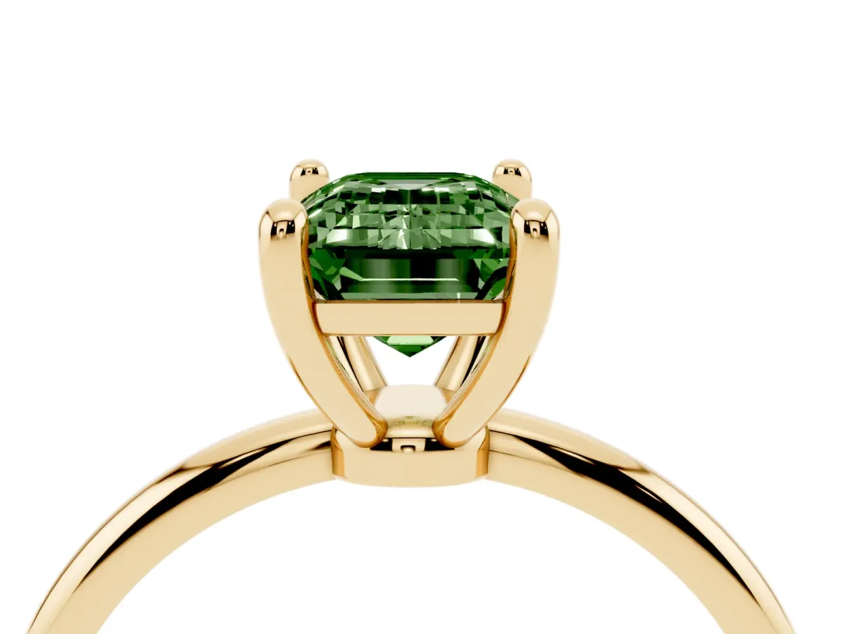 Fancy Green Emerald Cut Solitaire Diamond Ring with 4-Prong Setting on a Classic Band Yellow gold