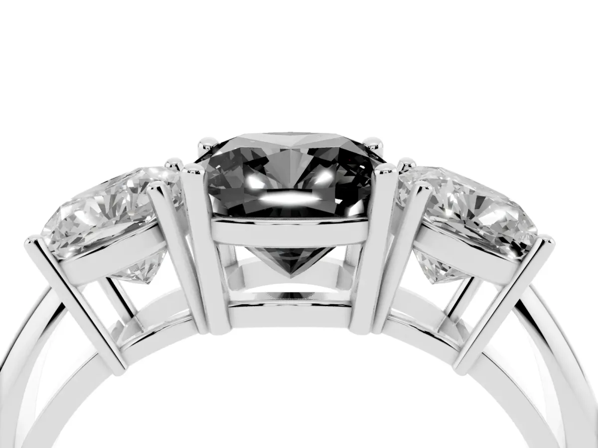 Fancy Black Three-Stone Cushion Cut Cut Diamond Engagement Ring with Prong Setting on a White Gold Band Platinum