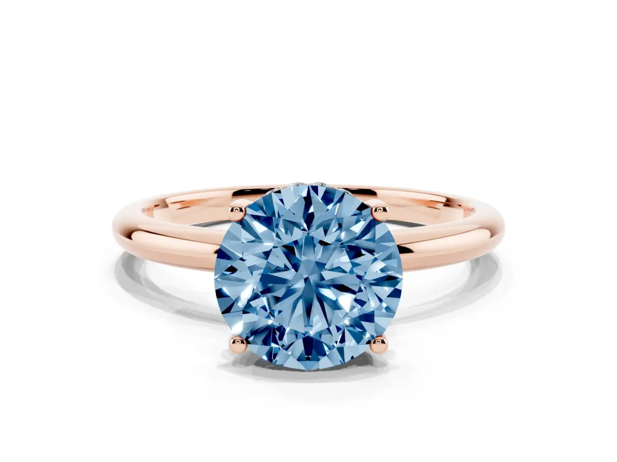 Fancy Blue Round Cut Cut Solitaire Engagement Ring with Four-Prong Setting and Classic Band Rose gold