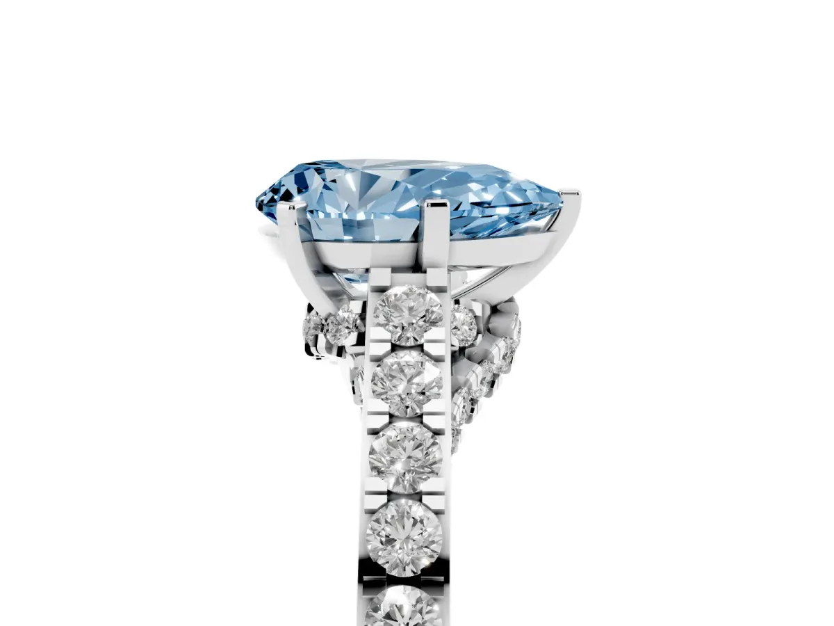 Fancy Blue Pear Cut Diamond Solitaire Ring with Crossover Gallery and Round Pavé Band Platinum