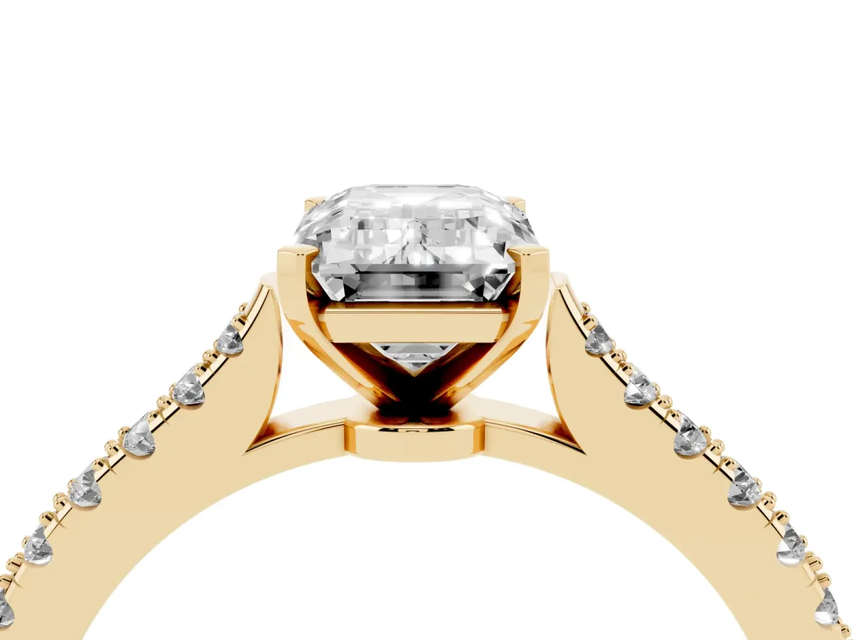 Emerald Cut Cut Solitaire Diamond Engagement Ring with Pave Band and Four-Prong Setting Yellow gold