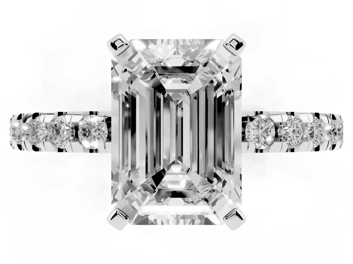 Emerald Cut Diamond Solitaire Ring with Round Pavé Band and Four-Prong Setting Silver